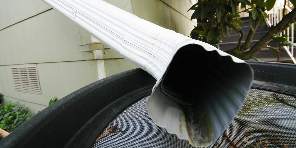 using a downspout to keep water away from your house